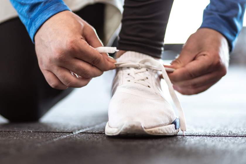 tying exercise shoes